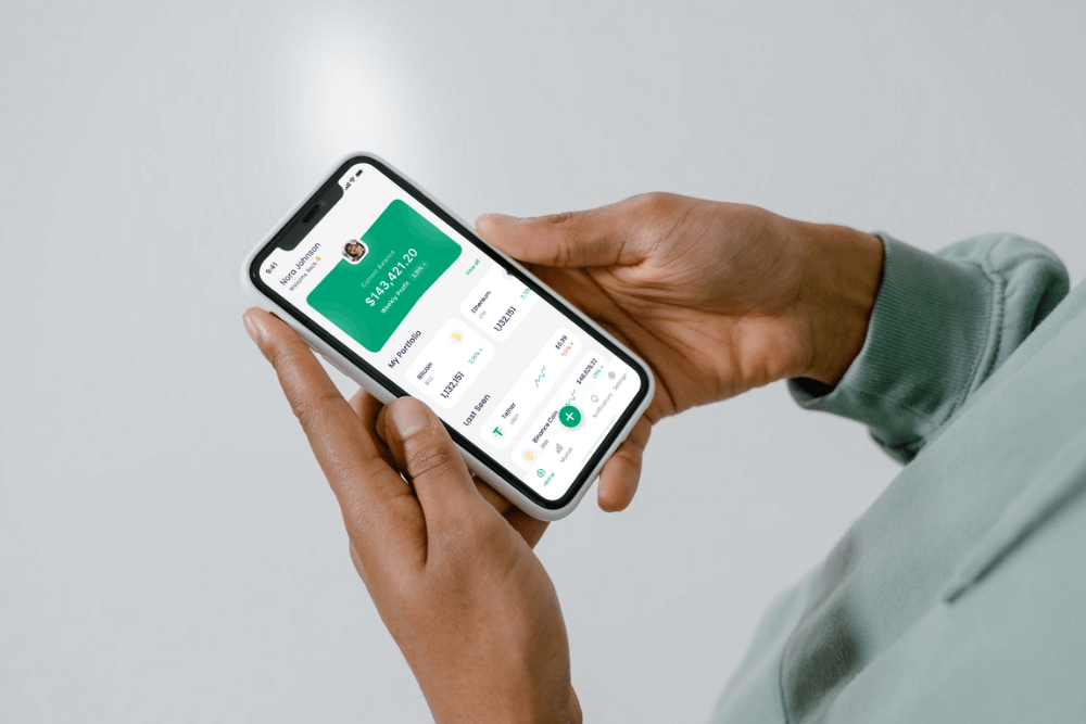 user checking his crypto portfolio via a crypto mobile app